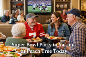 Guests enjoying appetizers and conversation during a Super Bowl party at Peach Tree Retirement Center in Yakima, Washington